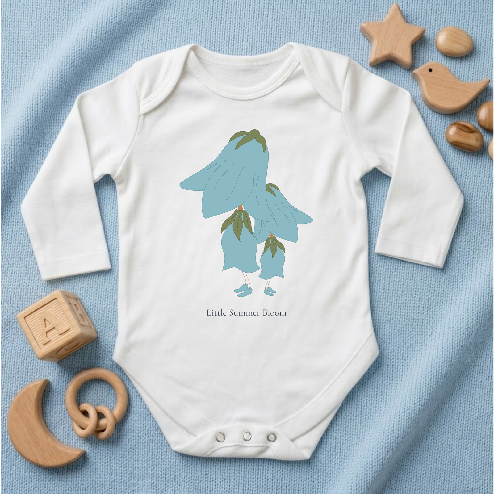 Bluebell baby bodysuit in white (0–6 months) with hand-drawn illustration from the Bloom collection by Justmimmi