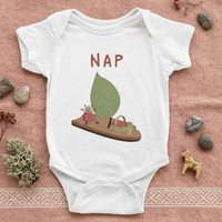 NAP baby bodysuit in white with hand-drawn sleepy character illustration by Justmimmi
