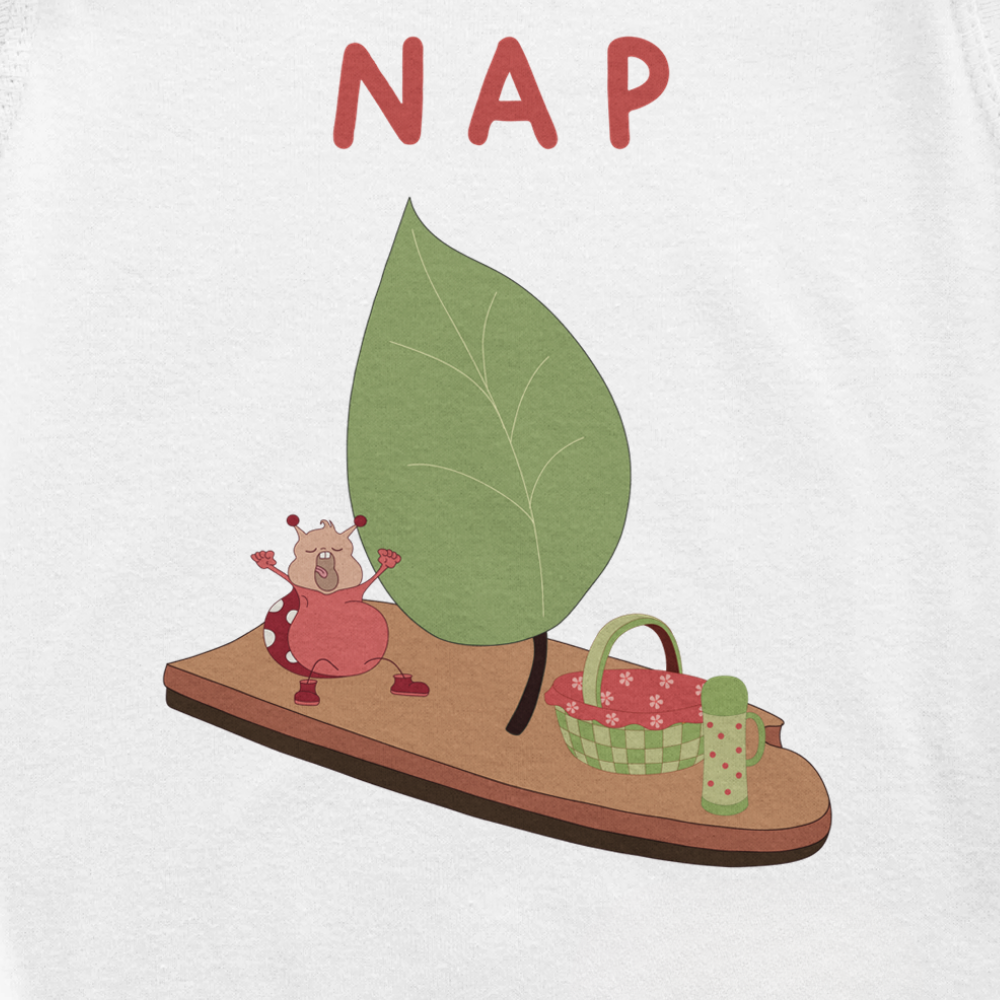 Close-up of the NAP print on white baby bodysuit by Justmimmi