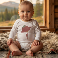 Baby wearing the Poppy bodysuit in white (0–6 months) with hand-drawn illustration by Justmimmi